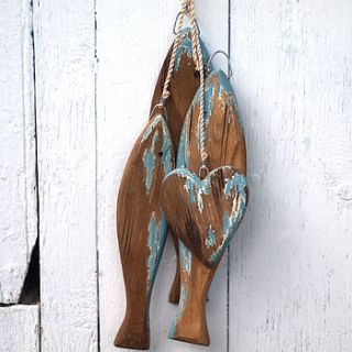 hanging wooden fish and heart by drift living