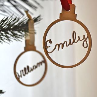 personalised wooden name bauble by clouds and currents