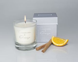 cinnamon and orange scented candle in a glass by sophie allport