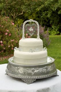 white and silver arch wedding cake decoration by birchcraft