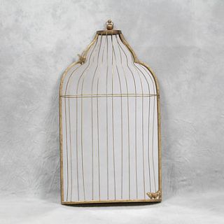 gold birdcage mirror by daisy west