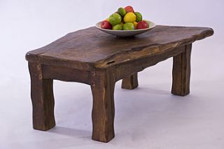 handmade chunky dark wooden coffee table by kwetu