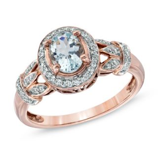Oval Aquamarine and 1/6 CT. T.W. Diamond Frame Vine Ring in 10K Rose