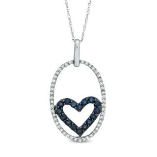 Blue Sapphire and 1/4 CT. T.W. Diamond Heart in Oval Pendant in 10K