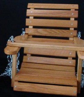 Amish Handcrafted Sassafras Wood Child Country Porch Swing. This Great Addition to Your Backyard Will Bring Hours of Fun to Any Child. Made By the Old Order Amish with Sassafras Wood and Finished with Weather Proofing Polyurethane to Withstand All Types of