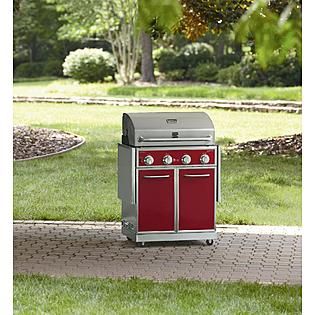 Kenmore Red 4 Burner Gas Grill With Folding Side Shelves and lit knobs