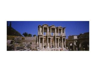 Tourists in front of the old ruins of a library, Library At Epheses, Ephesus, Turkey Print by Panoramic Images